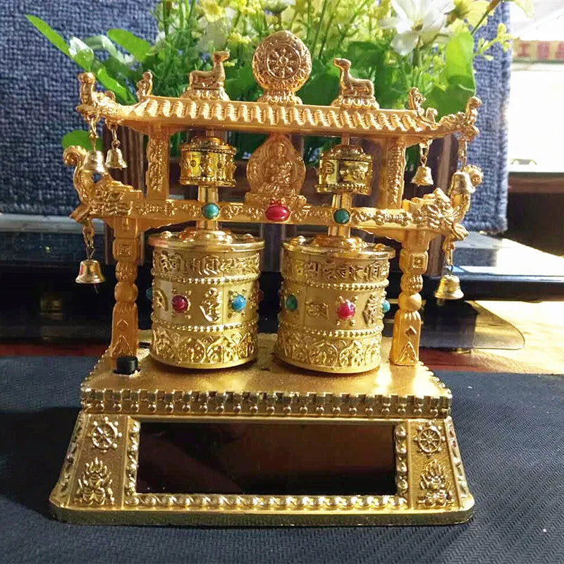 Electric alloy prayer wheel car decoration with rotating mechanism on dashboard