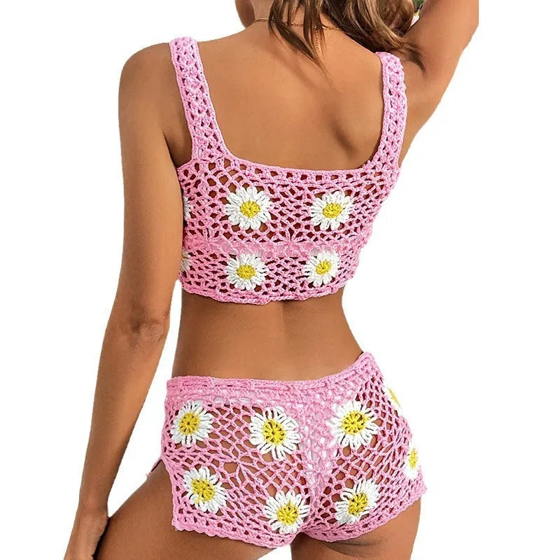 Light green floral patterned bikini swimsuit top and pants set on a neutral background.