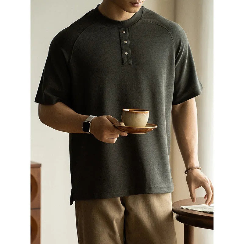 Casual loose pullover top with raglan sleeves in a terry texture fabric, shown in smoky grey.