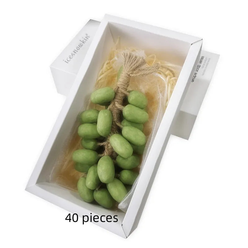 Handmade grape soap in black, green, litchi, and purple variants with bulk packaging options