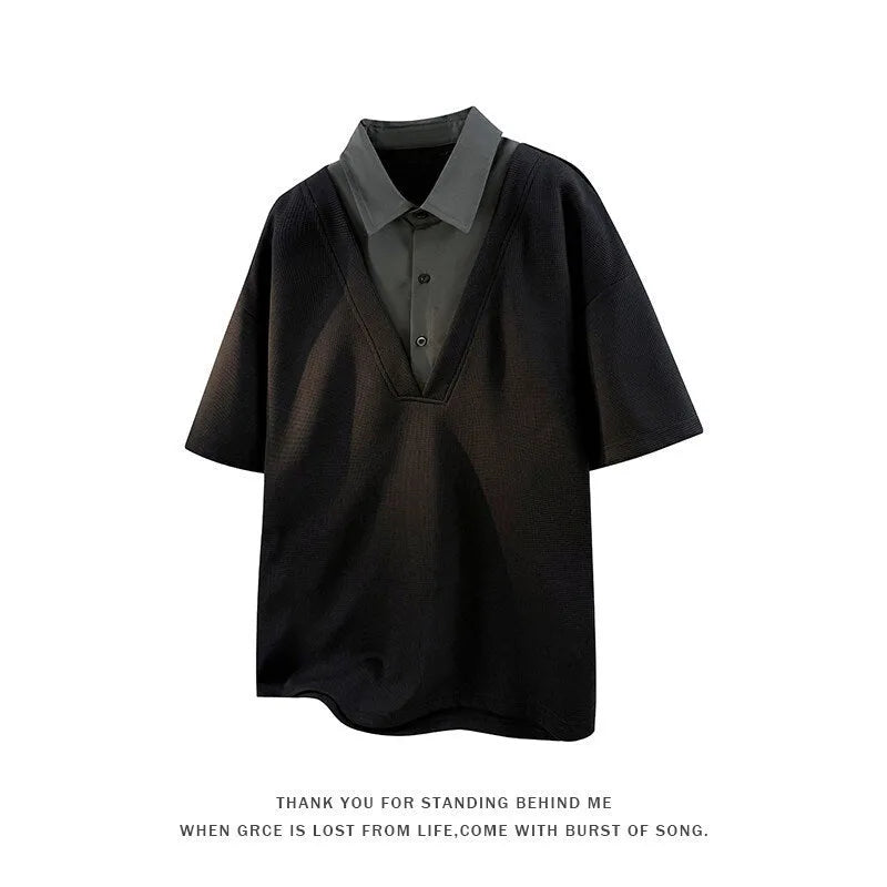 Men's black short-sleeve pullover sweater with a structured padded Henry collar.