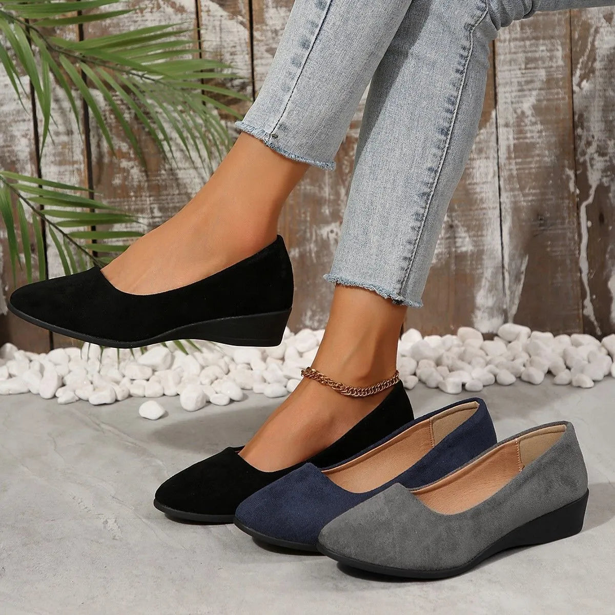 Women's casual wedge pumps with pointed toe, suede upper, and low rubber heel in multiple colour options