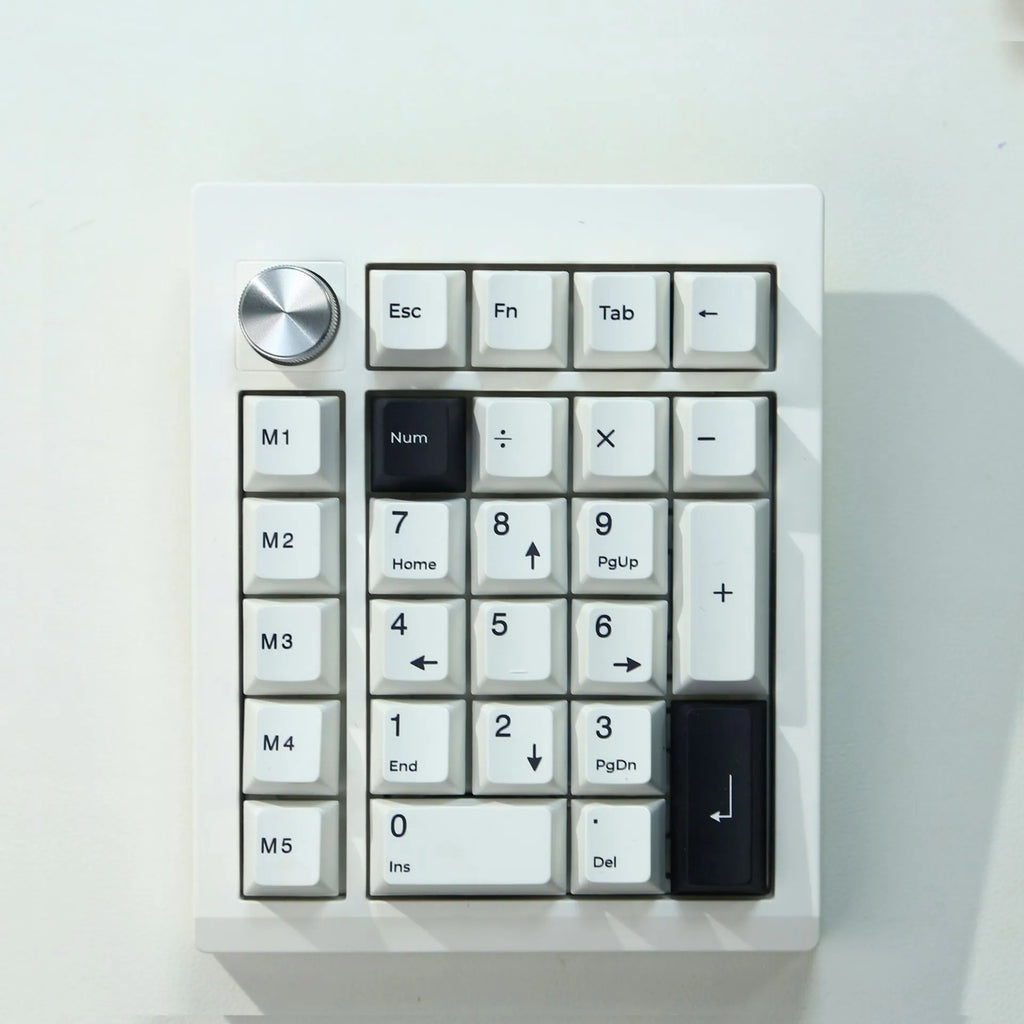 Wireless mechanical numeric keyboard in black and white colour options showing Bluetooth connectivity