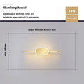 Gold-framed LED mirror cabinet with integrated makeup lights mounted on a bathroom wall.