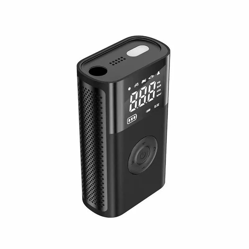 T2191-2 handheld wireless digital display air pump with LED light and multiple nozzle attachments on a table.