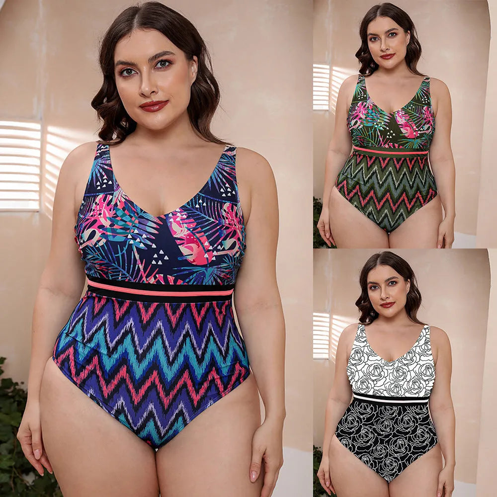 Women's blue printed one-piece swimsuit with spaghetti straps and a striped vest style.
