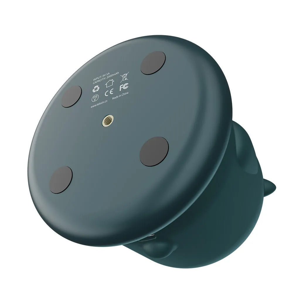 Dark green intelligent follow-up gimbal with AI camera on 360-degree rotating base