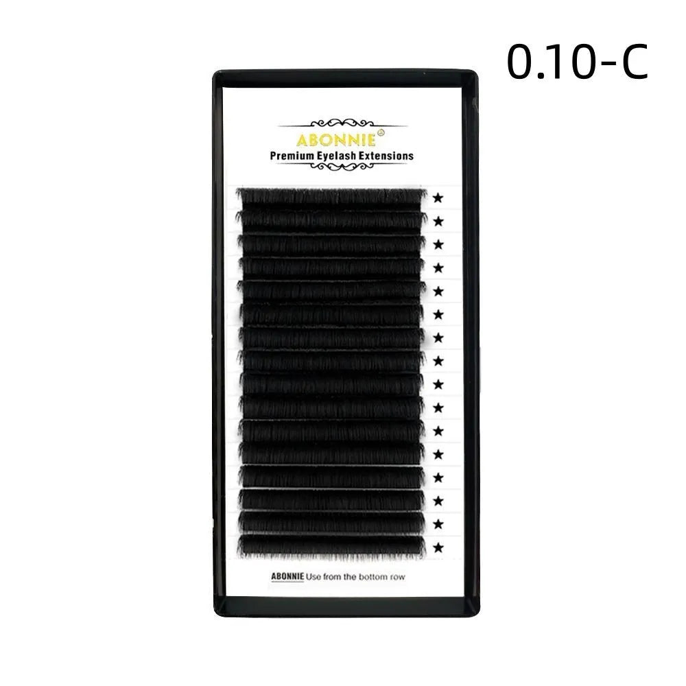 Pack of matte mink hair false eyelashes showing dense 16-row strip on a clear background.