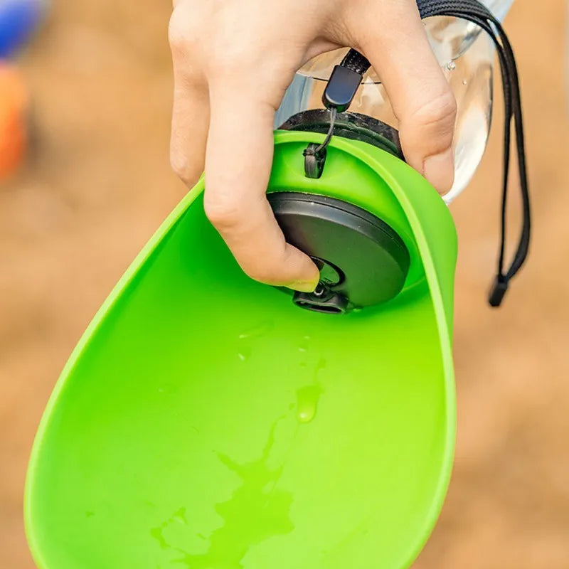 Portable pet water bottle with drinking bowl in sky blue colour showing 680ml capacity and carrying options