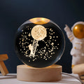 Luminous starry sky crystal ball on wooden base, USB-powered for desktop decoration.