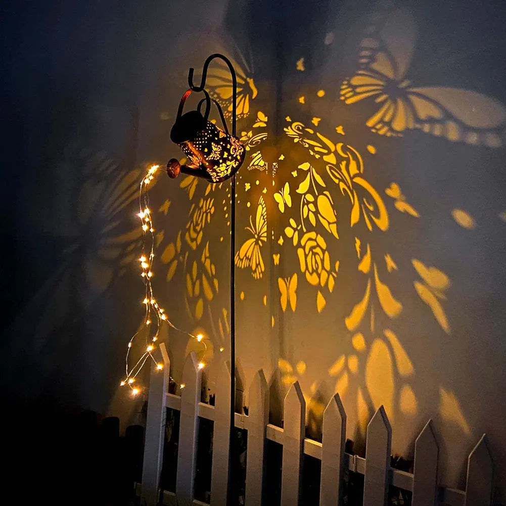 Solar-powered iron butterfly garden lamp with warm white LED lighting for outdoor decorative use
