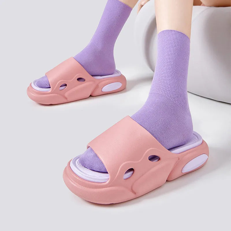 Women's and men's two-colour thick-soled EVA slippers shown in pink purple, white green, and black white colour options.