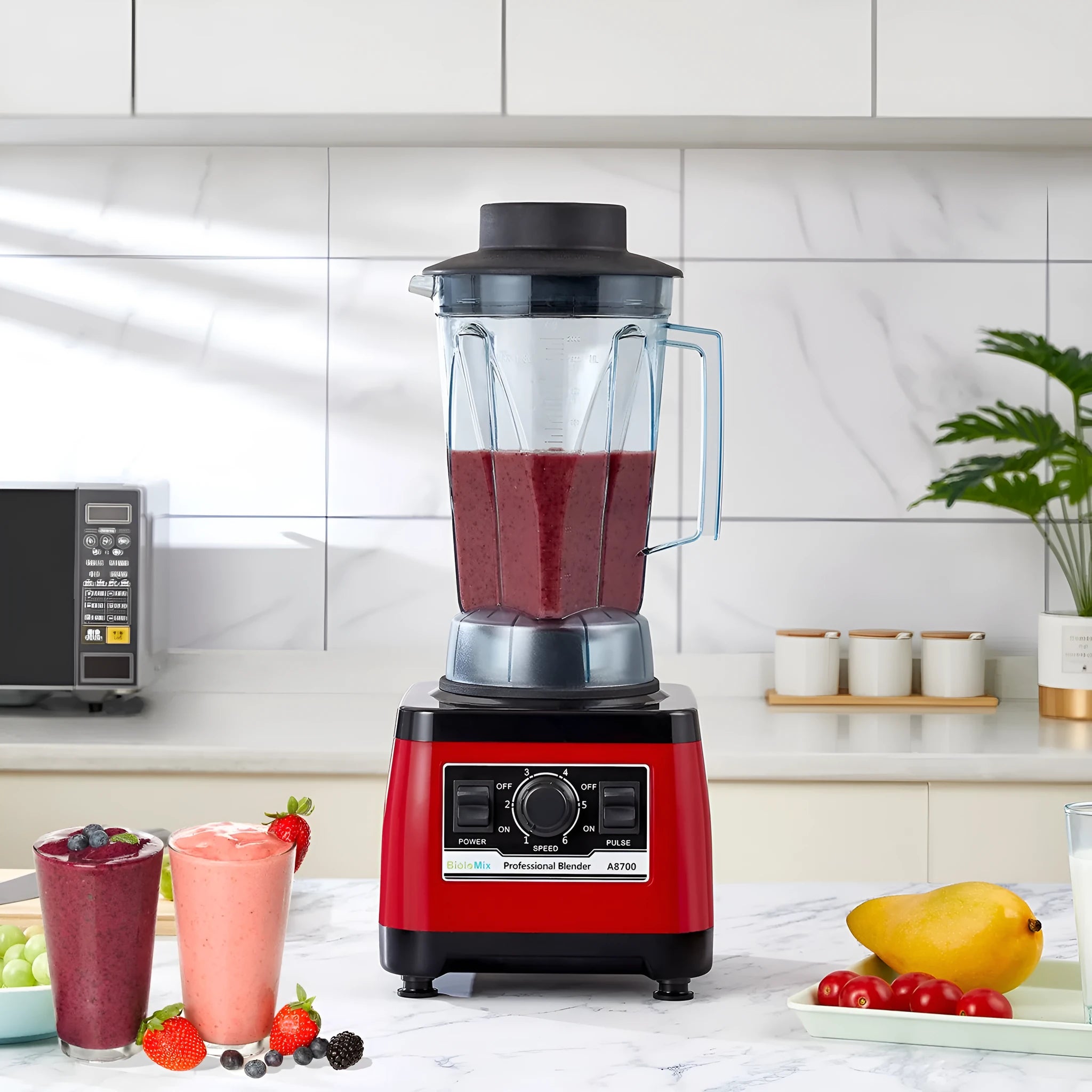 Red industrial-style commercial blender with 2200W power and 2-litre capacity jug.