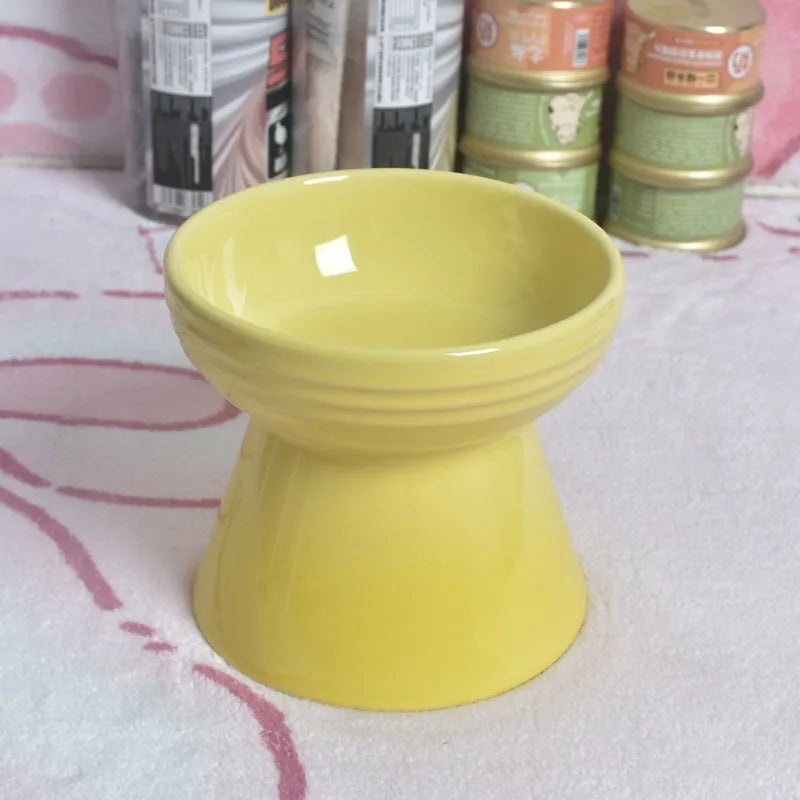 Ceramic pet bowl with high foot design showing anti-tumble stability feature