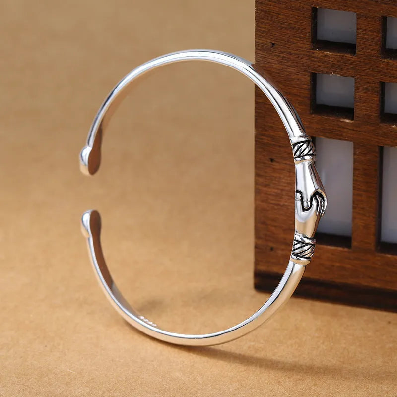 Retro copper handshake creative bracelet for women in silver metal finish