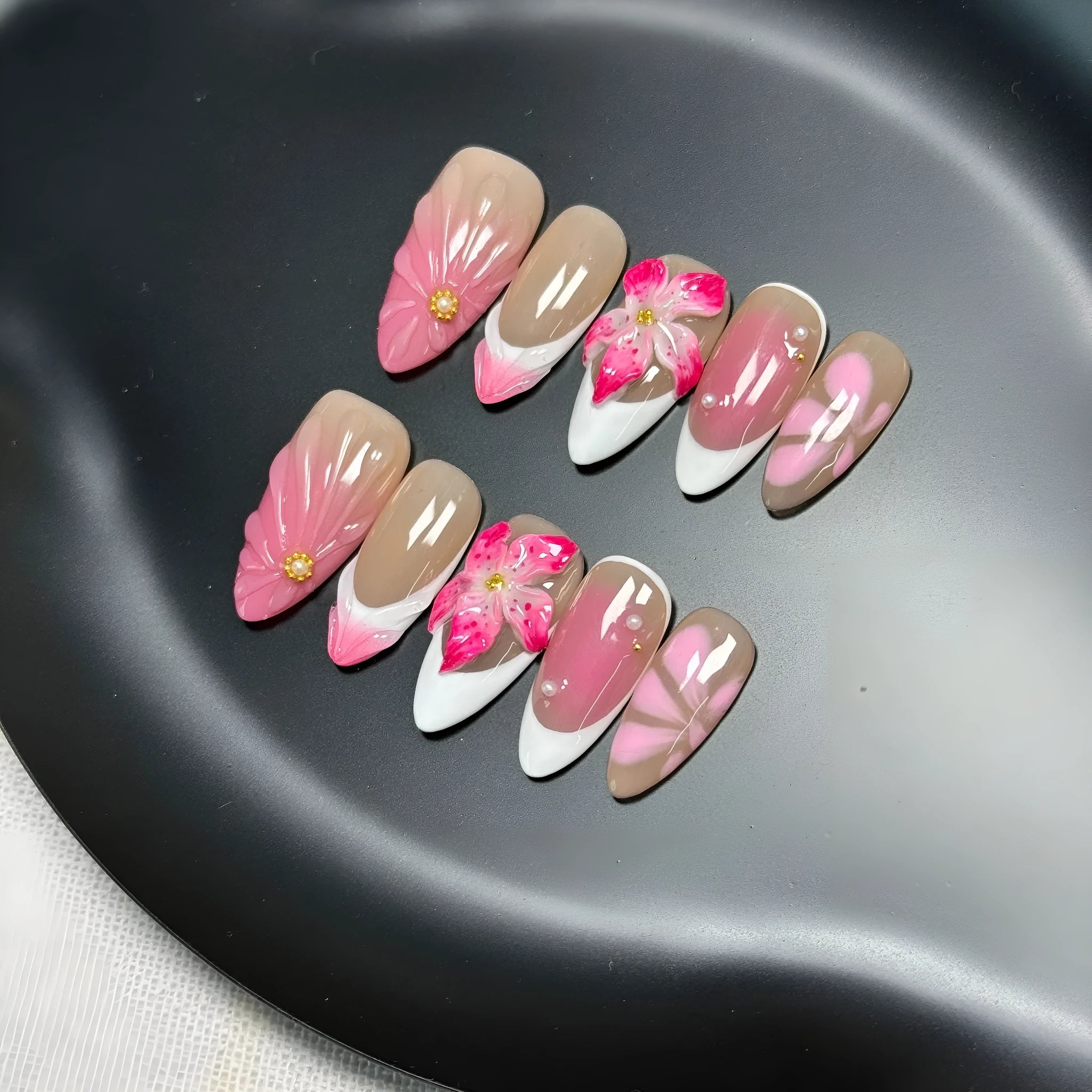 French style 3D nail art decals with fluid ice flower and lily designs in plastic almond shape wearables