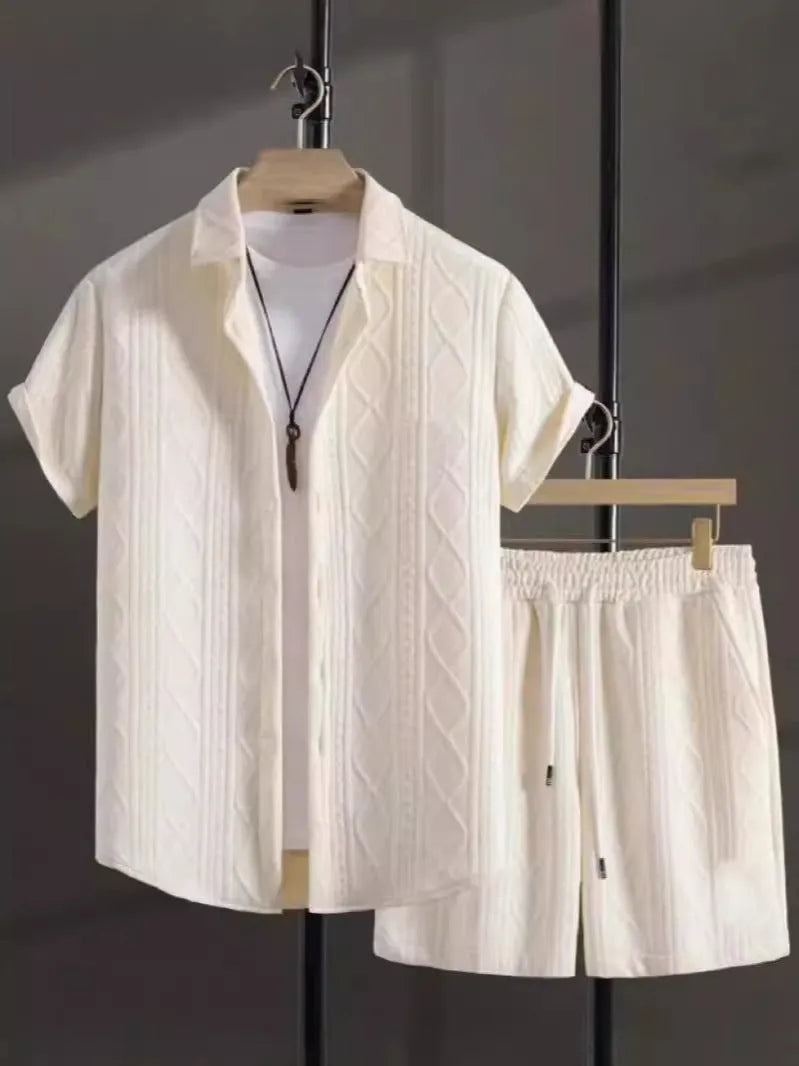 Man wearing a beige jacquard short sleeve suit jacket with matching shorts