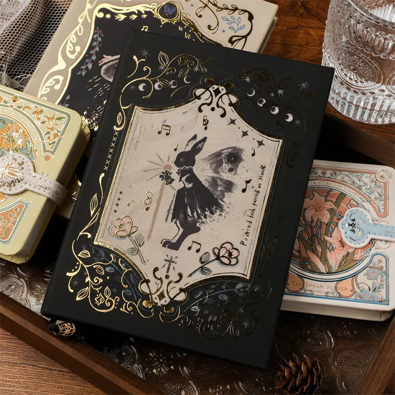 A5 retro Gothic art notebook with thematic cover, shown next to pen for scale