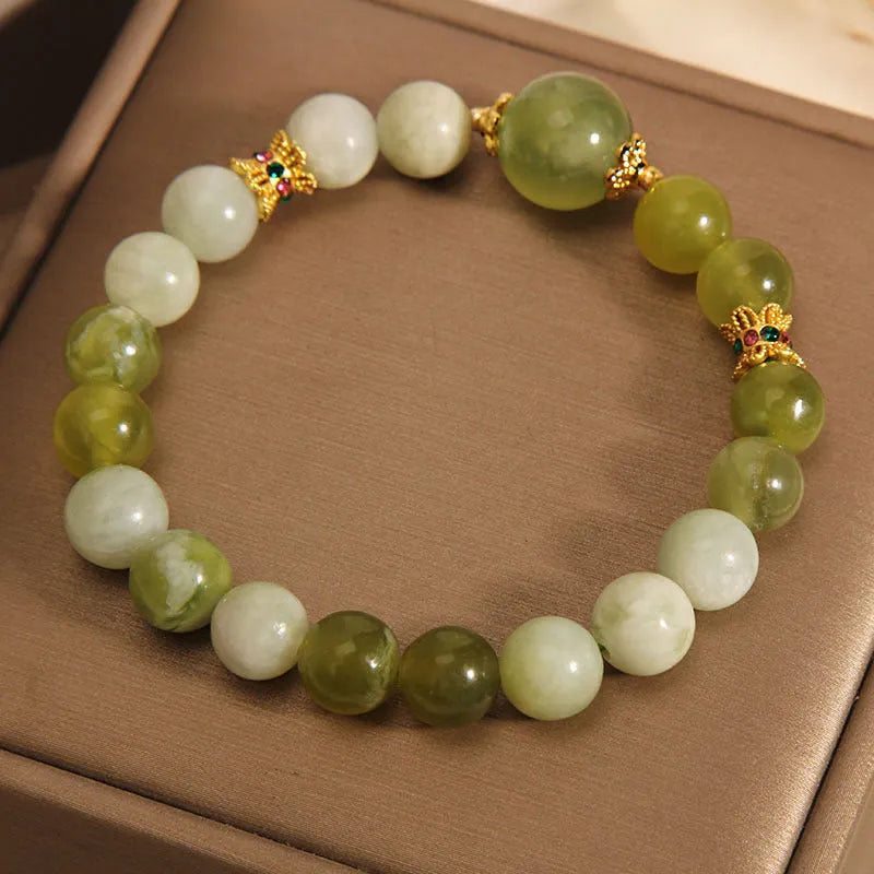 Women's genuine jade bracelet in Xiuyan jade green colour, mori-inspired original design.