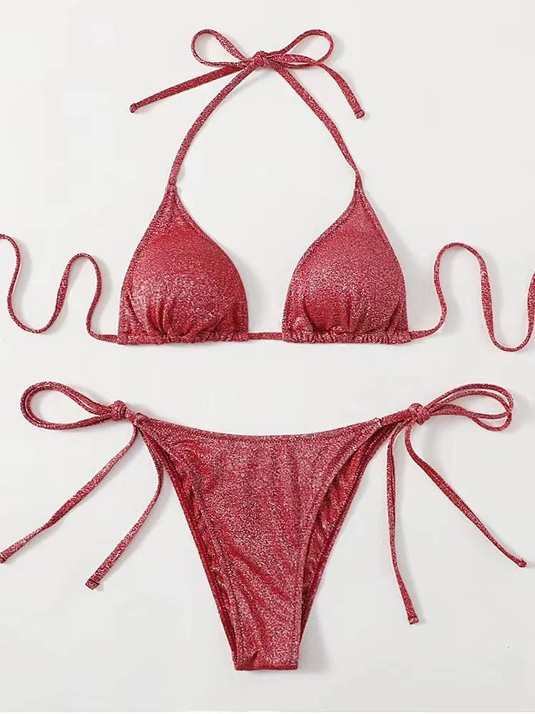 Women's bandage-style bikini swimsuit in polyester available in six colours with detailed size chart