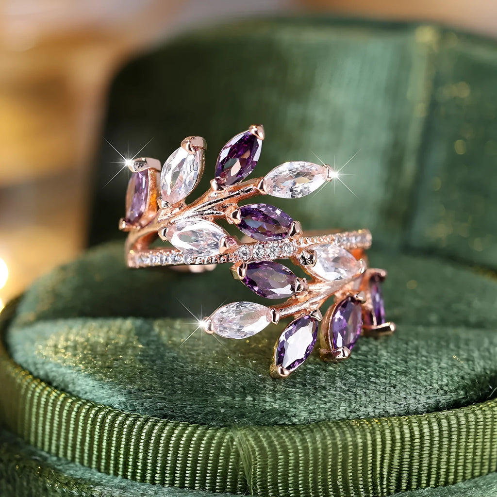 Adjustable copper leaf-shaped fashion ring with a central horse eye zircon stone in a rose gold finish.