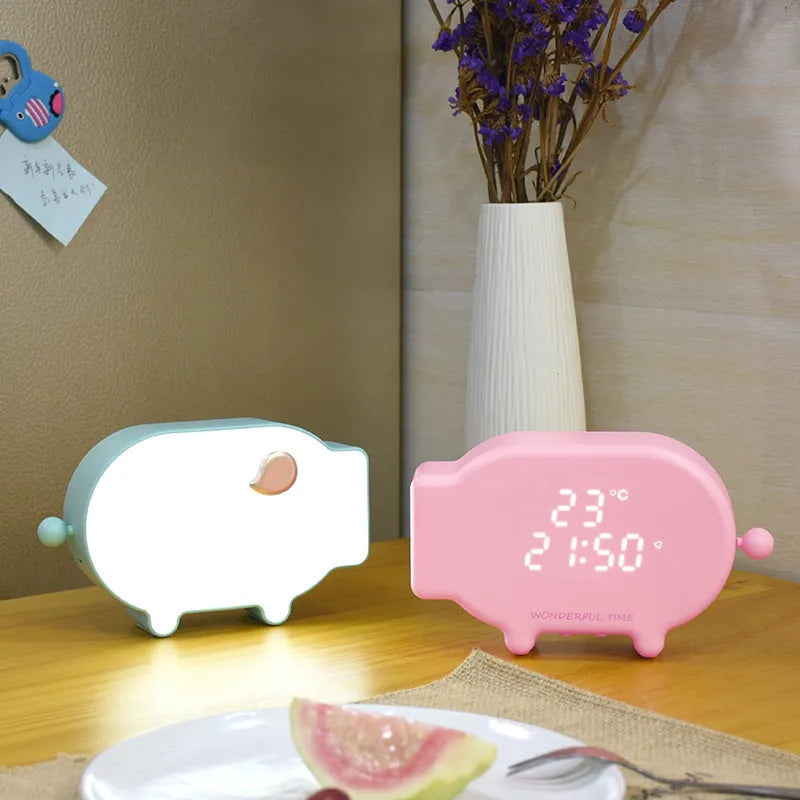Blue or pink LED alarm clock with digital temperature display and USB charging port