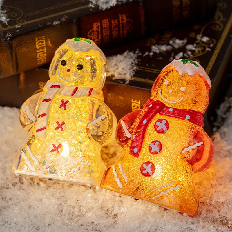 Glowing gingerbread man Christmas ornament with snowman design in plastic construction