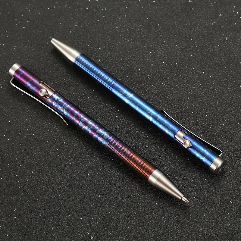 Titanium alloy gun bolt handle ballpoint pen with phantom colour finish showing knurled grip texture