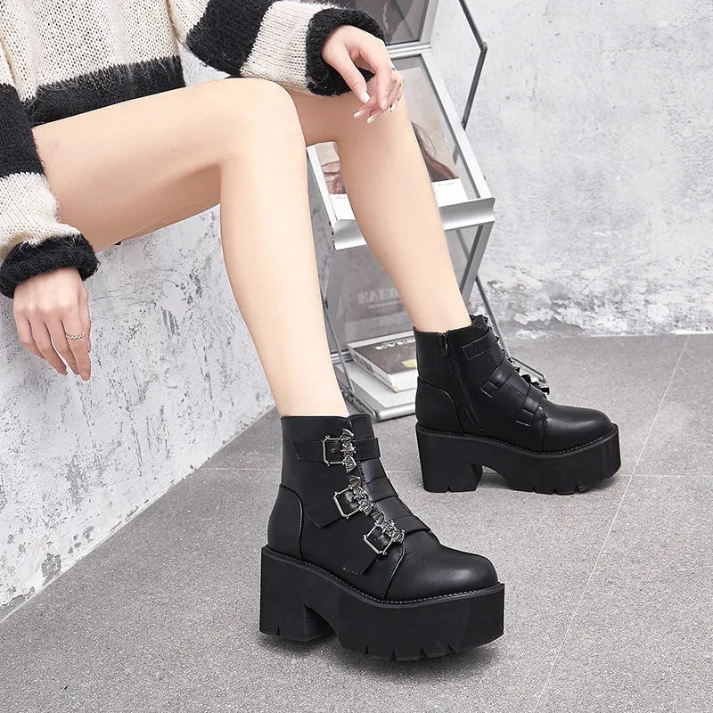 Women's black Harajuku punk ankle boots with bat buckle, side zip, and thick heel.