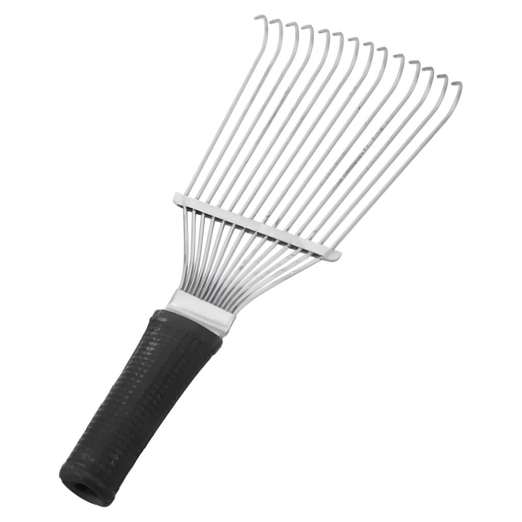 Stainless steel dematting brush rake comb for dog and horse grooming on a table.