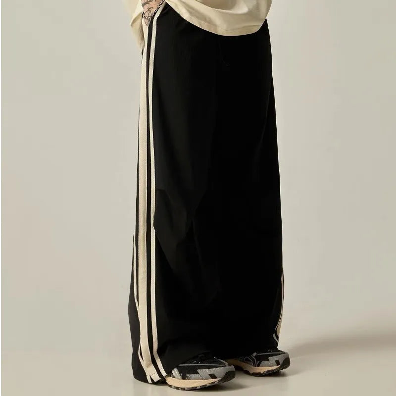 Men's black wide leg climbing trousers with high waist and straight cut in polyester fibre material