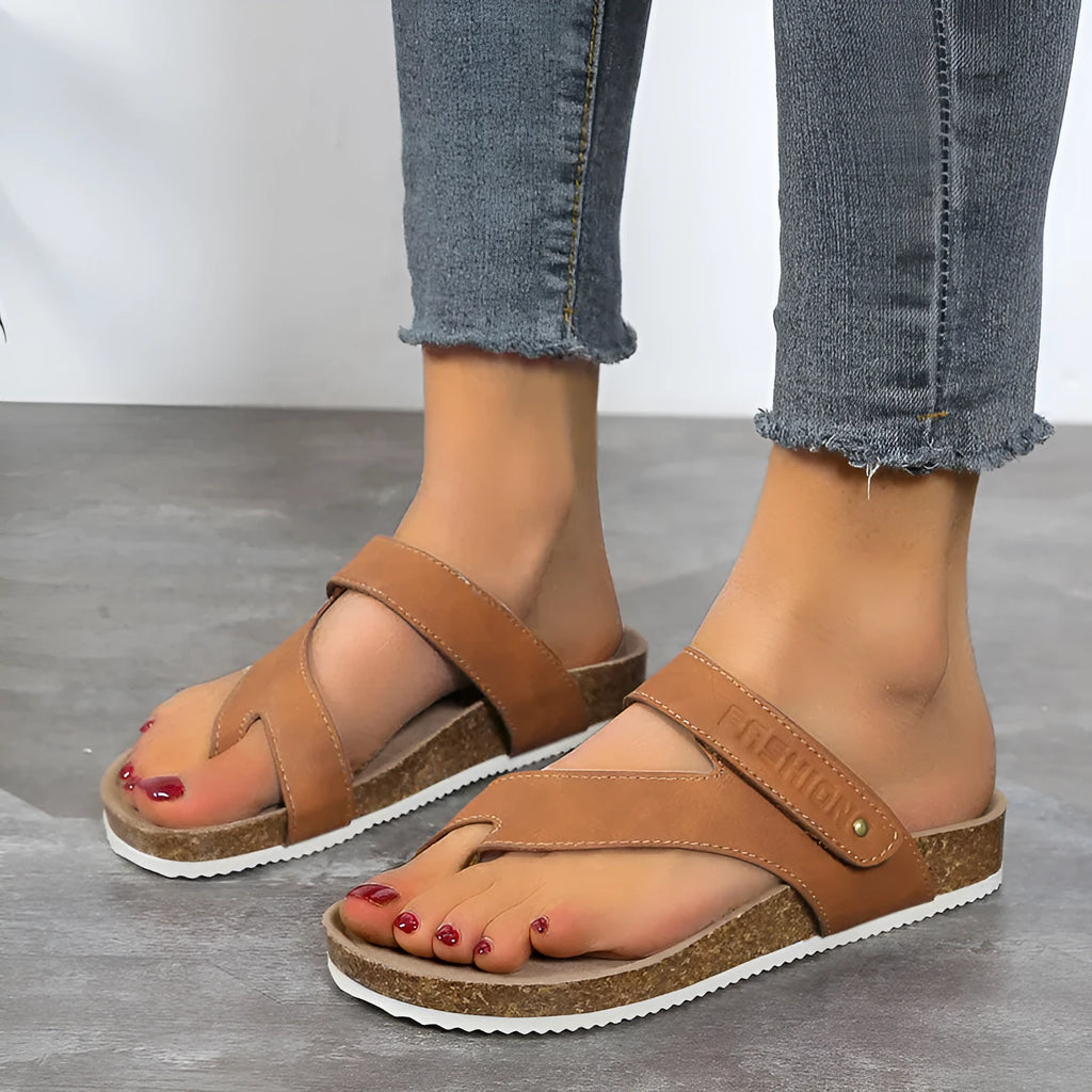Flat toe ring thick-soled flip-flops in a solid colour with a foam sole.