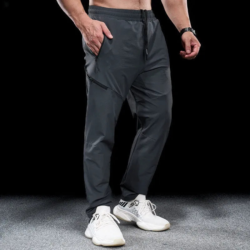Men's waterproof quick-dry nylon workout trousers in multiple colours for sports and leisure