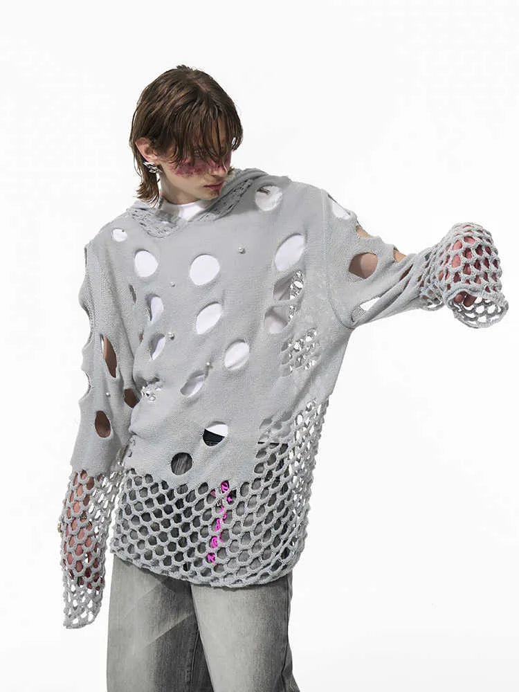Black men's hoodie with pearl decoration showing loose fit and regular sleeves