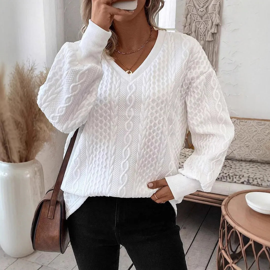 Milky white loose fit long sleeve T-shirt with 3D pattern detail on mannequin