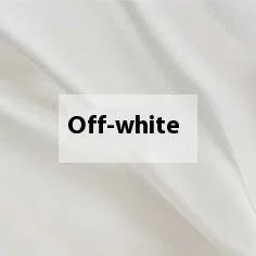 Solid colour silk duvet cover laid flat, showing double-sided construction and smooth texture.
