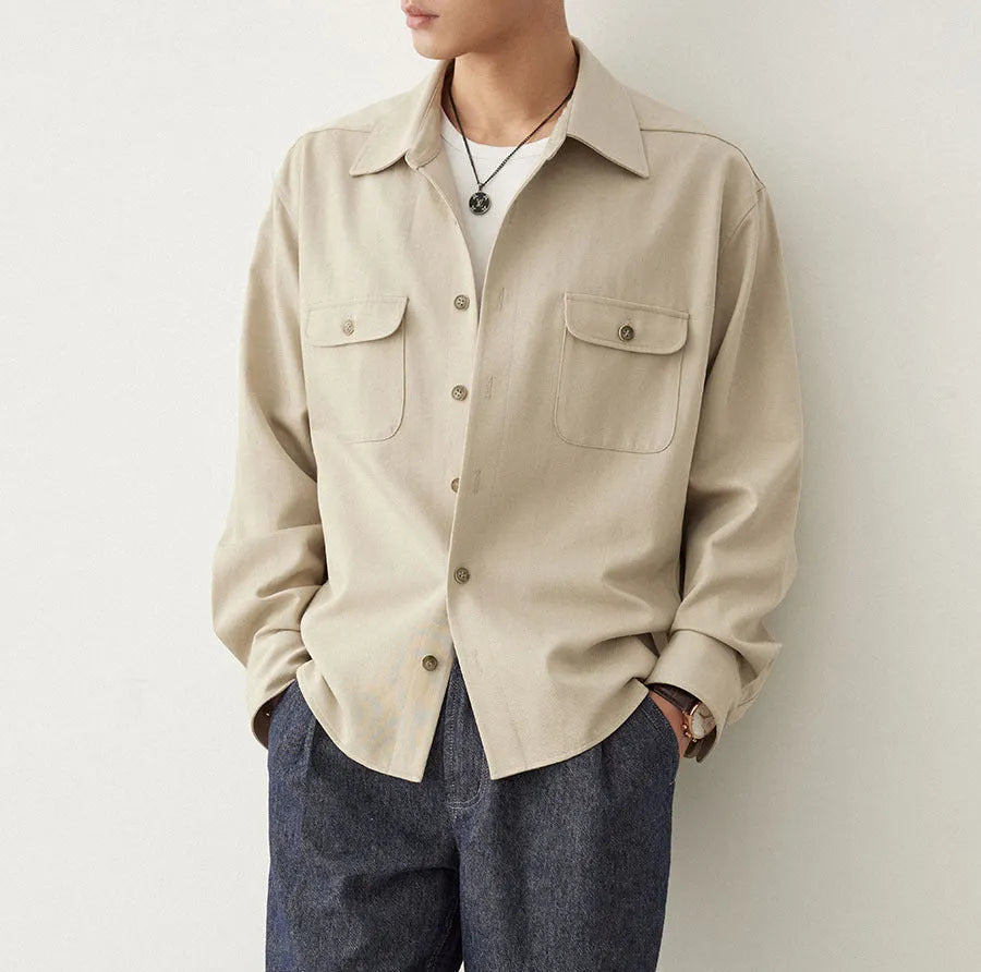 Men's light sand rice casual shirt with a lapel collar and long sleeves.