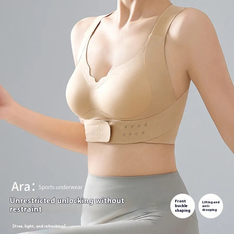Women's front buckle back shaping sports bra for yoga in black, white, or nude.