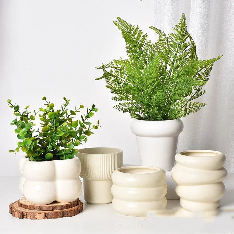 Roman column matte yellow ceramic flower pot for indoor plants.