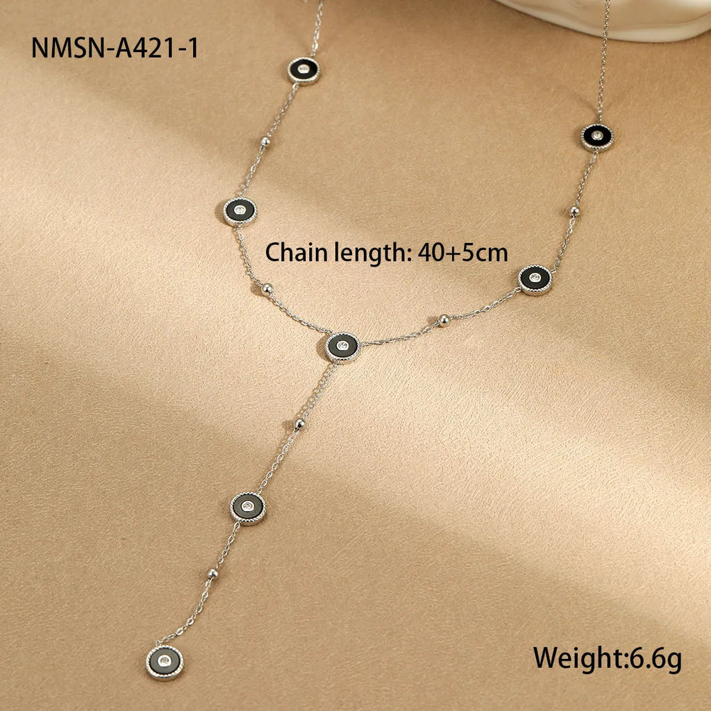 Geometric fritillary pattern stainless steel bracelet with 18K gold plating and matching necklace