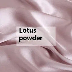Solid colour silk duvet cover laid flat, showing double-sided construction and smooth texture.