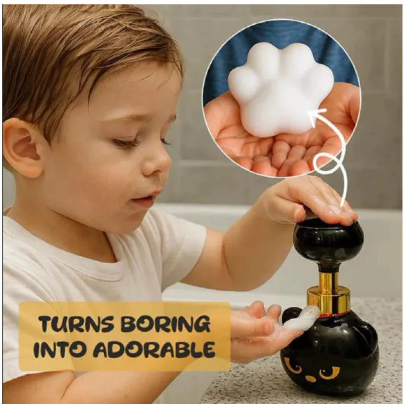 Black plastic cartoon cat-shaped automatic foam soap dispenser, dimensions 10x10x18cm.
