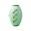 Green and white reusable gel lint roller ball for pet hair removal on fabric.