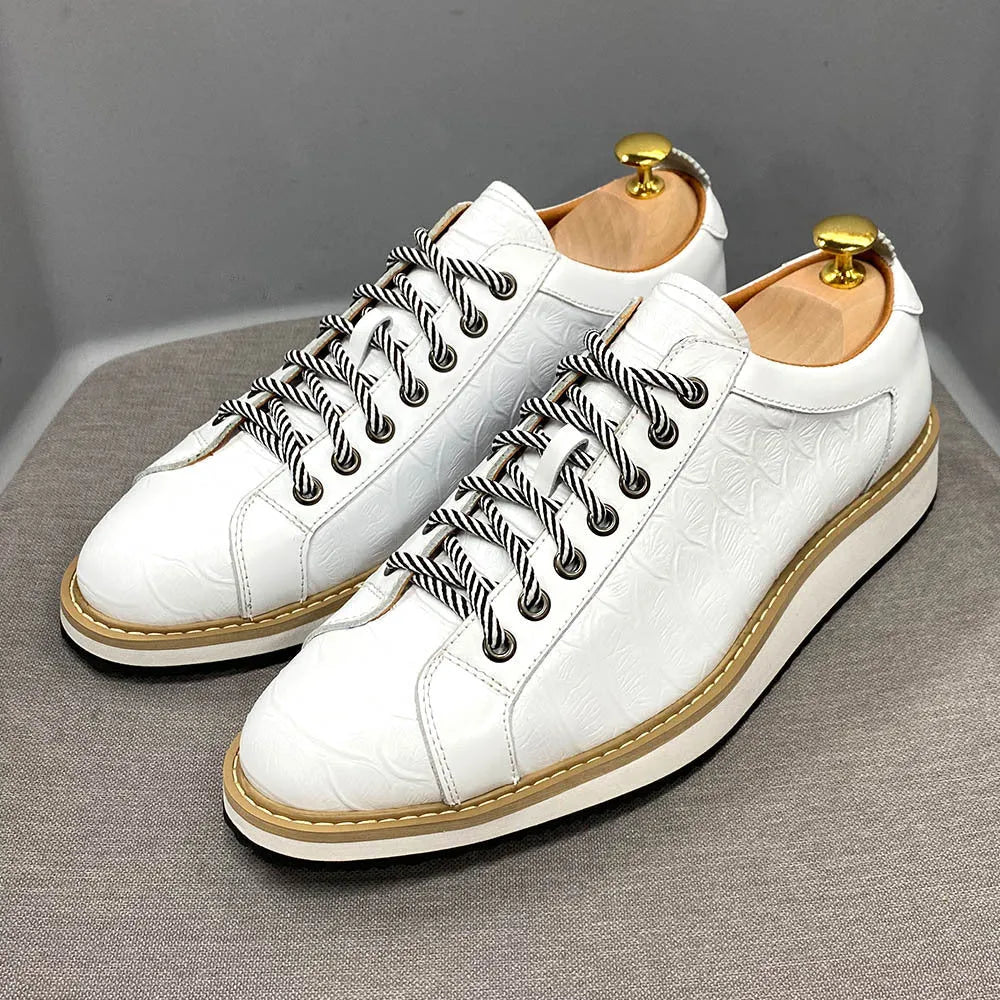 Men's low-cut casual shoes with an embossed pattern and front tie laces, shown in multiple colours.
