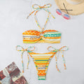 Women's halter neck bikini swimsuit in blue, yellow, or green stripe patterns