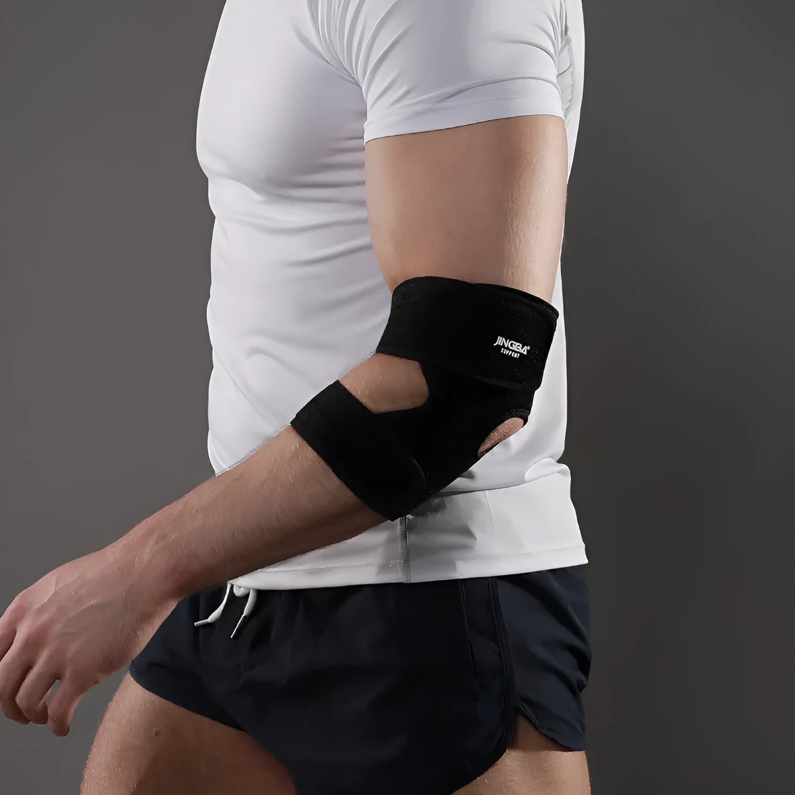 Black adjustable sports elbow guard for adult training in multiple sports