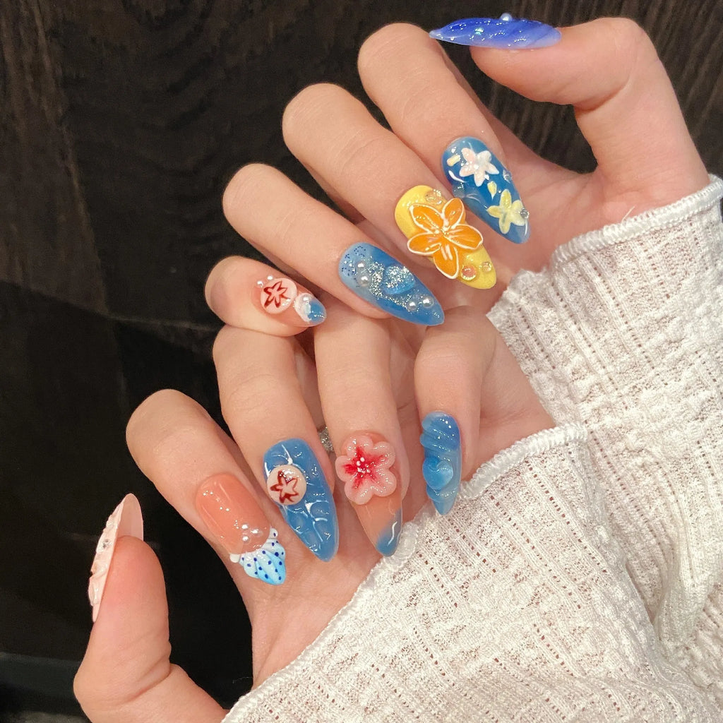 Plastic wearable armour with a carved three-dimensional jellyfish design in almond nail colour.