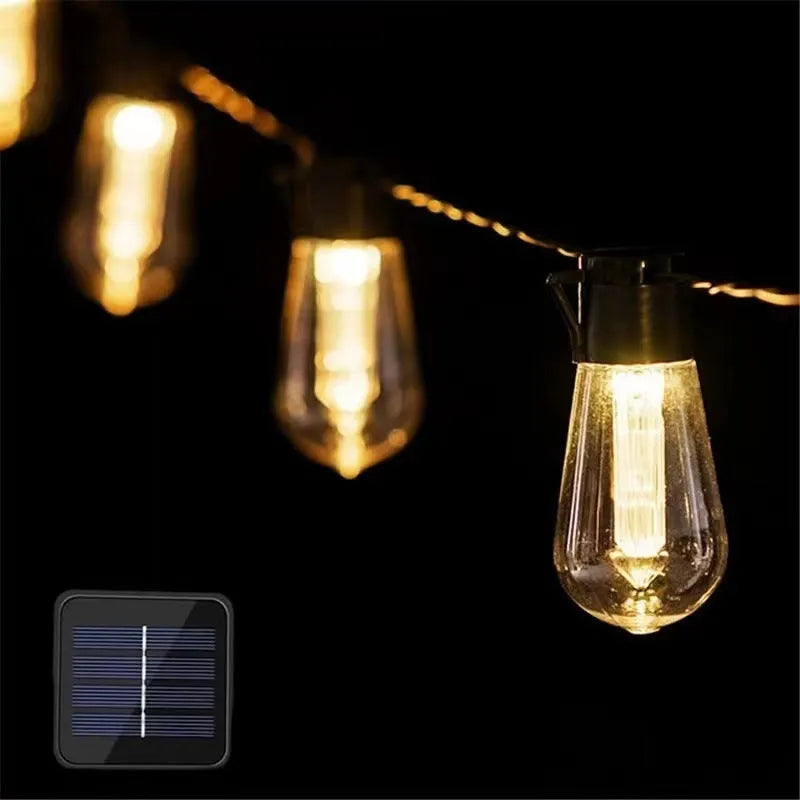 Retro outdoor string lights with infusion bottle-shaped bulbs in garden setting