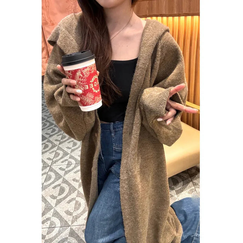 Women's long knitted cardigan with hood in oatmeal colour, below knee length, loose fit