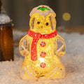 Glowing gingerbread man Christmas ornament with snowman design in plastic construction